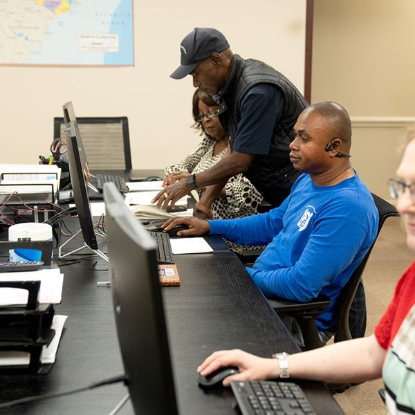 Dispatch staff working at computer stations
